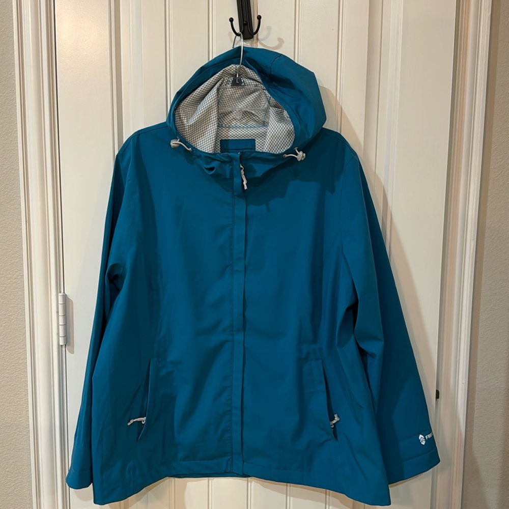 Free Country Waterproof rain coat with hood. Beautiful teal color in size XXL.